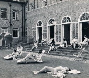 Nurses sunbathing on steps of Victoria Home