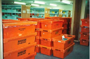 stacks of orange packing crates ready for the move