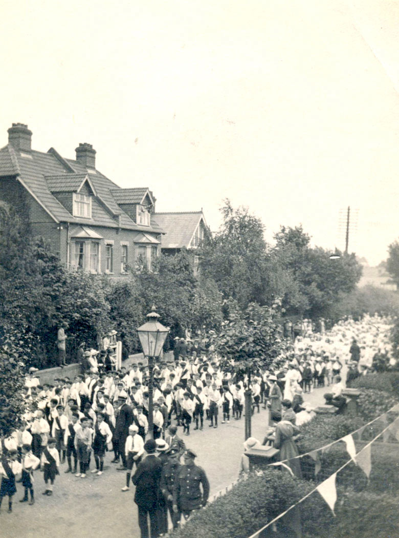 Salisbury Peace Parade, 1919 – Youth parade dressed in costume with sash, note 2 soldiers watch from the roadside