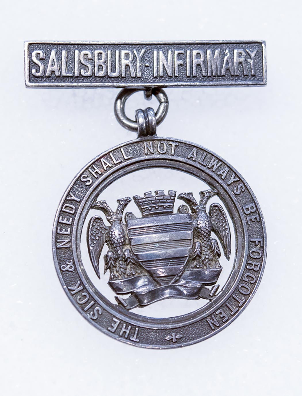 2019.39.2 nurse badge Salisbury Infirmary silver badge