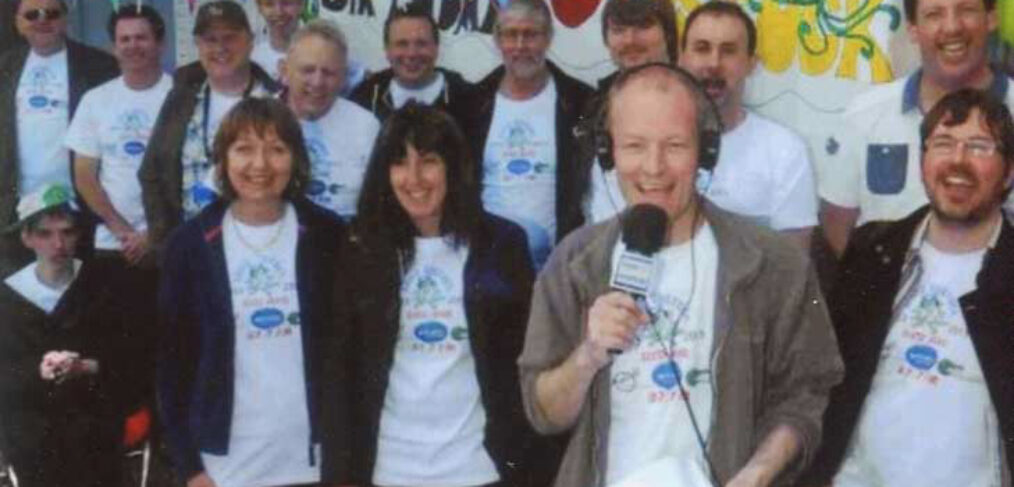 colour photograph of group of people outside Radio Odstock