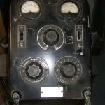 close up of dials on machine for power, voltage etc