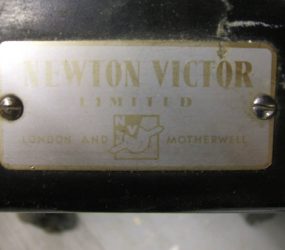 Newton Victor company name plate attached to x-ray machine
