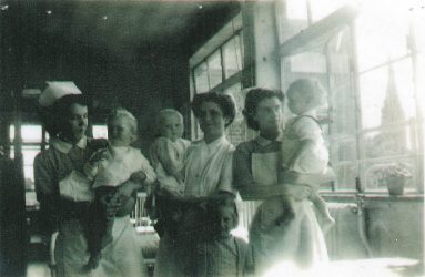 Nurses holding babies