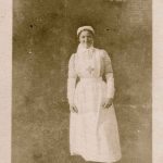Nurse posing in the hospital garden
