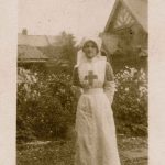 Nurse posed in hospital garden