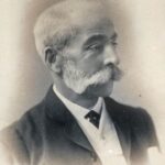 Sepia photograph portrait of man with large moustache