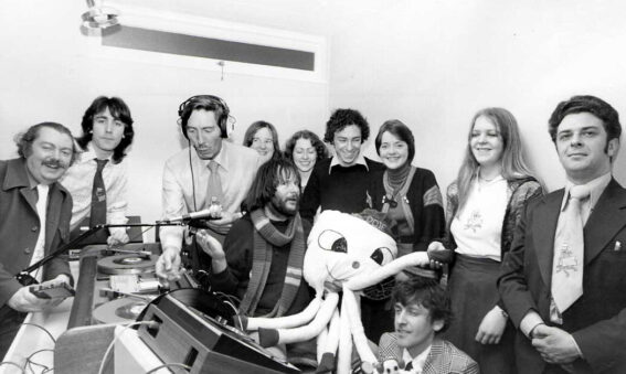 Black and white photograph of Bill Oddie opening a radio station