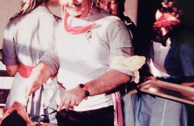 John Barron dressed as a pirate carving the turkey