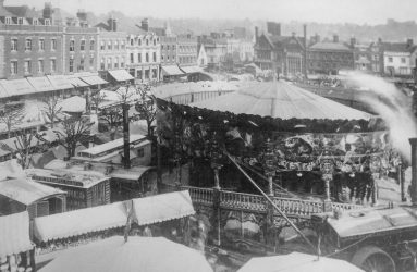 Steam carousel and wagons in Market Place, Salisbury