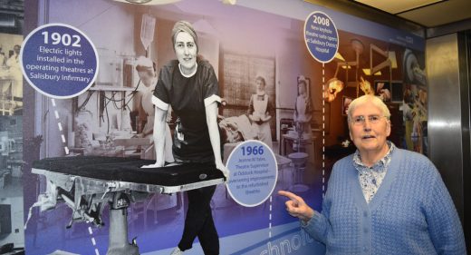 Jeanne Yates today points to photo of herself in 1966 displayed in hospital lift