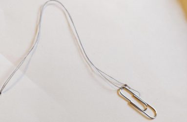 cotton thread tied to paper clip