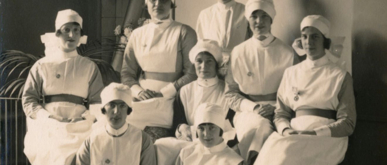 Midwifery students posing for photo in uniform