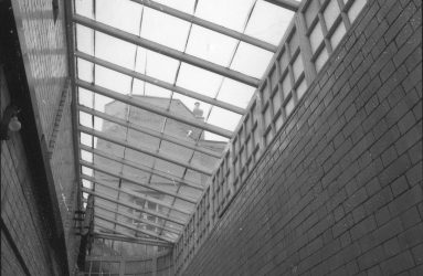 Glass roof over passageway, with views to outside
