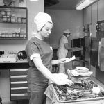 Theatre staff lay out sterile trays