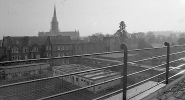 View across SGI rooftops, with cathedral spire in background